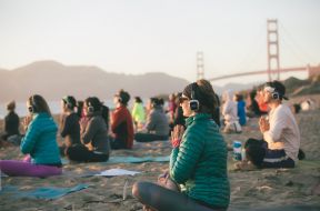 Team Silent Disco Yoga on Baker Beach