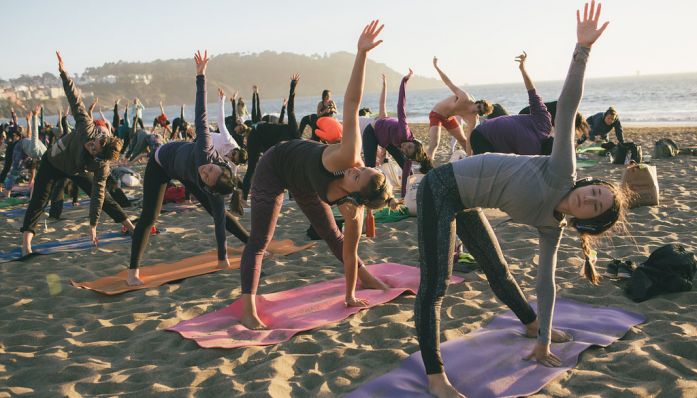 Team Silent Disco Yoga on Baker Beach from Outdoorsie